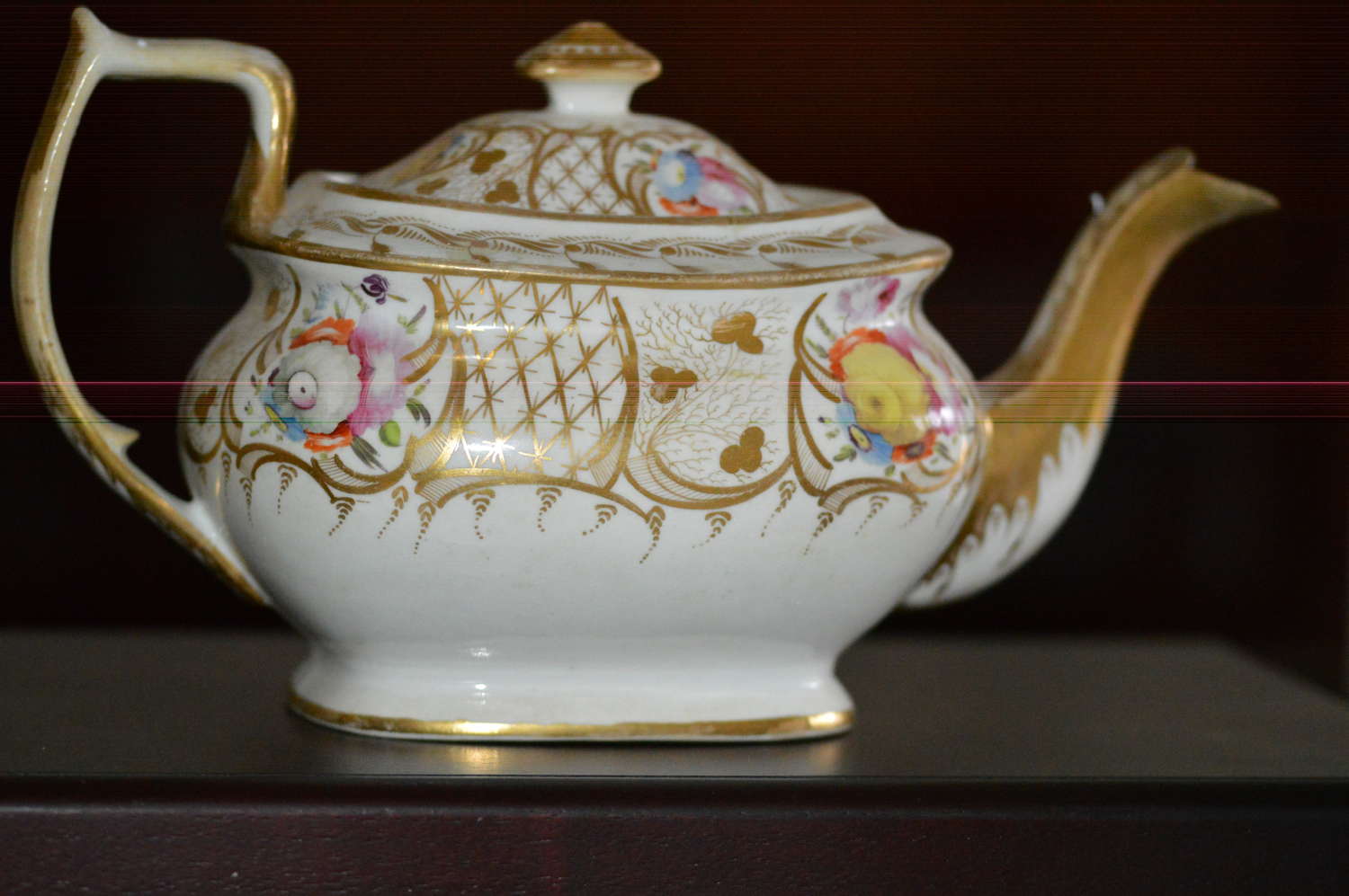 An early 19th Century Porcelain Coalport Teapot and Cover c1810-20