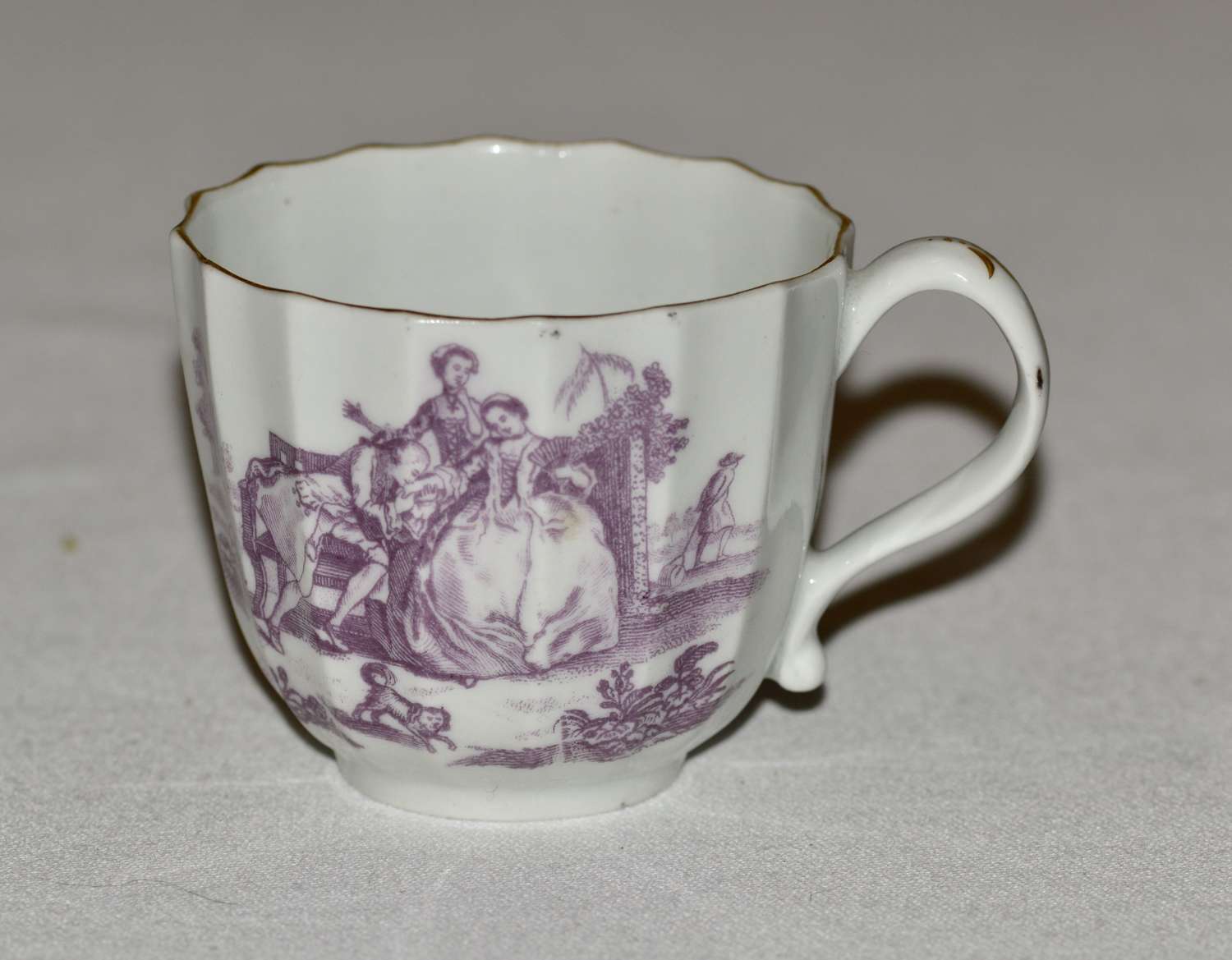 A Worcester L'Amour Pattern Porcelain Fluted Coffee Cup. c1770